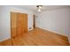 A spacious bedroom offers a closet, hardwood floors, and plenty of natural light at 3257 Georgian Woods Cir, Decatur, GA 30034