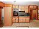 Spacious eat-in kitchen with ample storage and views to other rooms at 3257 Georgian Woods Cir, Decatur, GA 30034