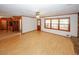 Spacious living room featuring a ceiling fan, hardwood floors, and natural light at 3257 Georgian Woods Cir, Decatur, GA 30034