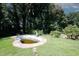 Overgrown in-ground pool with slide at 3257 Georgian Woods Cir, Decatur, GA 30034