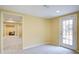 Basement featuring carpet and door to the outside at 5004 Duxford Se Dr, Smyrna, GA 30082