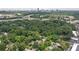 Aerial view of the area, including the city skyline and the lush greenery of surrounding trees at 998 Northrope Ne Dr, Atlanta, GA 30324
