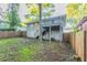 Backyard of house features gray deck with wooden fence at 1760 Spring Ave, Atlanta, GA 30344