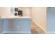 The bright kitchen features a breakfast bar, stainless steel appliances, and modern countertop at 1760 Spring Ave, Atlanta, GA 30344