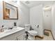 Bathroom showcases a tiled shower, white fixtures, and a classic design at 2501 Northbrook Rd, Snellville, GA 30039