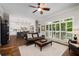 Comfortable living room showcasing hardwood floors, natural light and seamless open concept at 1143 Brookhaven North Cir, Brookhaven, GA 30319