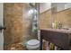 Bathroom featuring a tiled shower and vanity at 207 Walthall Nw St, Marietta, GA 30064