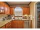 Kitchen area featuring granite countertops, and wooden cabinets at 207 Walthall Nw St, Marietta, GA 30064