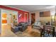 Cozy living room featuring hardwood floors, an American flag, and comfortable furniture at 207 Walthall Nw St, Marietta, GA 30064