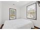 A bedroom with clean, white walls and a window with bright natural light shining through at 2776 Grand Ave, Atlanta, GA 30315