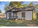 Charming single story home featuring a cozy covered entry porch and well-manicured lawn at 2776 Grand Ave, Atlanta, GA 30315