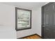 Laundry room with natural light, built in shelving, and black door at 2776 Grand Ave, Atlanta, GA 30315