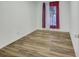 Cozy bedroom with hardwood floors, white walls, a window and a closet at 333 Lynne Cir, Alpharetta, GA 30009