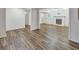 Spacious living room with fireplace, new hardwood flooring and freshly painted walls at 333 Lynne Cir, Alpharetta, GA 30009