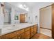 Bathroom features vanity with double sinks and a large mirror at 1554 Owens Store Road Rd, Canton, GA 30115