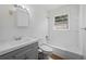 Bathroom featuring shower-tub combo, new vanity, and neutral finishes at 1554 Owens Store Road Rd, Canton, GA 30115