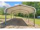 Sturdy carport offers protection for vehicles and equipment at 1554 Owens Store Road Rd, Canton, GA 30115
