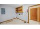 Functional laundry room with overhead storage and easy access to utilities at 1554 Owens Store Road Rd, Canton, GA 30115