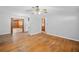 Spacious living room boasts hardwood floors, and seamless connection to other living spaces at 1554 Owens Store Road Rd, Canton, GA 30115