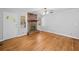 Bright living room showcases hardwood floors and a classic brick fireplace at 1554 Owens Store Road Rd, Canton, GA 30115