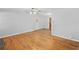 Bright living room featuring hardwood floors, ceiling fan and seamless transitions at 1554 Owens Store Road Rd, Canton, GA 30115