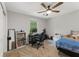 Bedroom featuring neutral walls, plush carpet, and a window with natural light at 2145 Kensington Sw Ct, Marietta, GA 30064