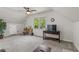 Bright bonus room features a ceiling fan, natural light, and plush carpet at 2145 Kensington Sw Ct, Marietta, GA 30064