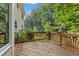Wooden deck with railing perfect for outdoor dining or relaxation at 2145 Kensington Sw Ct, Marietta, GA 30064