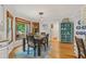Inviting dining area boasts hardwood floors and views of the landscaped backyard at 2145 Kensington Sw Ct, Marietta, GA 30064