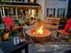 Cozy outdoor fire pit with seating for evening relaxation at 2145 Kensington Sw Ct, Marietta, GA 30064