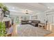 Spacious living room with exposed beams, brick fireplace and hardwood floors at 2145 Kensington Sw Ct, Marietta, GA 30064