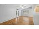 Bright bedroom with hardwood floors, a ceiling fan, and French doors leading to the outside at 3115 Chimney Cove Ln, Cumming, GA 30041