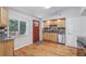 Cozy kitchen with light wood cabinetry, stainless steel appliances, and ample natural light from the window at 3115 Chimney Cove Ln, Cumming, GA 30041