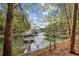 Picturesque lake view with docks at 3115 Chimney Cove Ln, Cumming, GA 30041