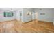 Bright living room featuring hardwood floors, natural light and neutral paint palette at 3115 Chimney Cove Ln, Cumming, GA 30041