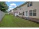 Exterior view of backyard featuring a concrete patio and a small storage shed, providing a practical outdoor area at 4055 Hill Station Ct, Sugar Hill, GA 30518