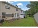 Exterior of backyard featuring a concrete patio and fenced-in lawn with a shed, perfect for outdoor enjoyment at 4055 Hill Station Ct, Sugar Hill, GA 30518