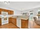 Open kitchen layout overlooking a cozy living area, perfect for entertaining at 4055 Hill Station Ct, Sugar Hill, GA 30518
