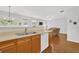 Functional kitchen blending into a comfortable living space, ideal for Gathering gatherings at 4055 Hill Station Ct, Sugar Hill, GA 30518