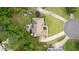 An aerial shot showcasing the property's manicured lawn, mature trees, and ample parking at 425 Starfire Ct, Suwanee, GA 30024