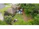Spacious backyard with a patio area, lush greenery, and mature trees creating a private oasis at 425 Starfire Ct, Suwanee, GA 30024