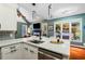 Kitchen area with white countertops and cabinets, and stainless steel appliances at 425 Starfire Ct, Suwanee, GA 30024
