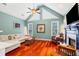 Inviting living room with vaulted ceilings, fireplace and ample natural light at 425 Starfire Ct, Suwanee, GA 30024