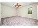 Spacious bedroom featuring carpeted floors and a ceiling fan at 10 Canyon Cove Cv, Ellenwood, GA 30294