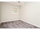 Cozy bedroom with a window providing natural light at 10 Canyon Cove Cv, Ellenwood, GA 30294