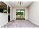 Dining area showcasing a sliding glass door and wood flooring, perfect for both casual meals and formal gatherings at 10 Canyon Cove Cv, Ellenwood, GA 30294