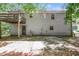Back of the house, showing a deck and door at 10 Canyon Cove Cv, Ellenwood, GA 30294