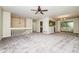 Spacious living room with neutral walls, gray carpet, and abundant natural light at 10 Canyon Cove Cv, Ellenwood, GA 30294
