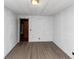 Bedroom featuring wood-look floors and a door at 2017 S Deshon Rd, Lithonia, GA 30058
