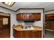 The kitchen has wooden cabinets, butcher block countertops, and a gas stove top at 2017 S Deshon Rd, Lithonia, GA 30058